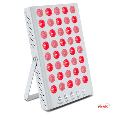 A photo of the PowerPanel mini with the lights on from the side. It shows the quick start buttons with different times and the possibility of setting either red light or near-infrared light