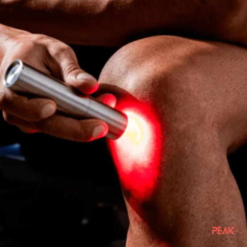 A photo of a man using the torch on his knee