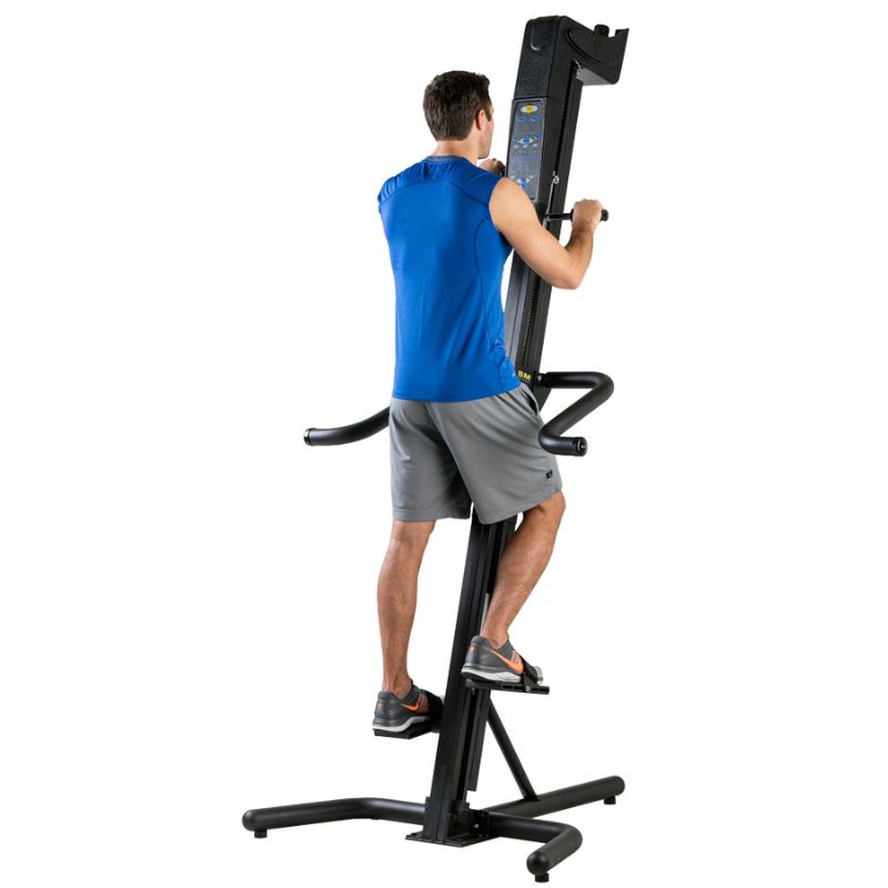 A man getting a full body workout (arms and legs) using the VersaClimber sport