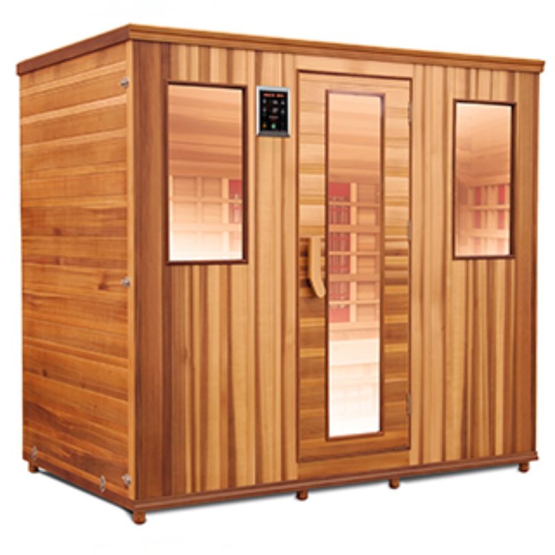A photo of  large commercial infrared sauna for 5 people. It has a digital controller, a large glass door and two windows.