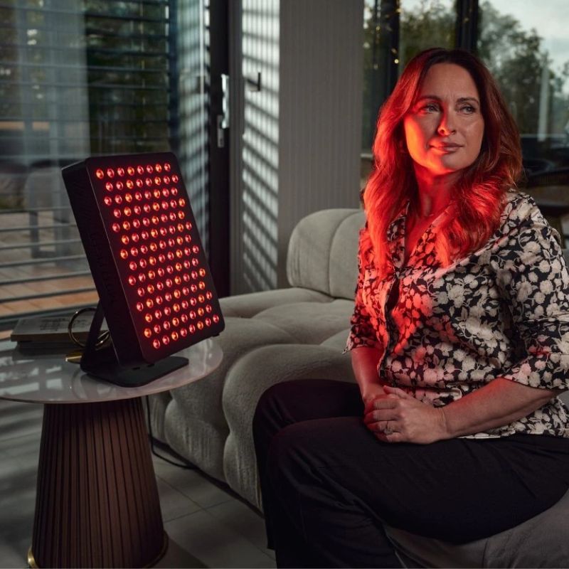 Red light therapy device in use for targeted recovery session