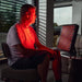 Red light therapy device in use for targeted recovery session