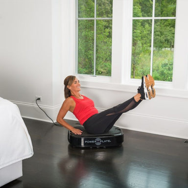 Use the vibration plate for abs exercises